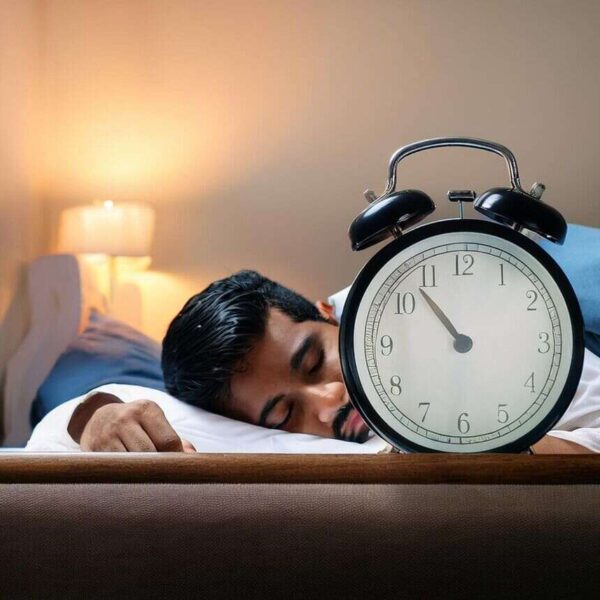 how did people wake up before alarm clocks